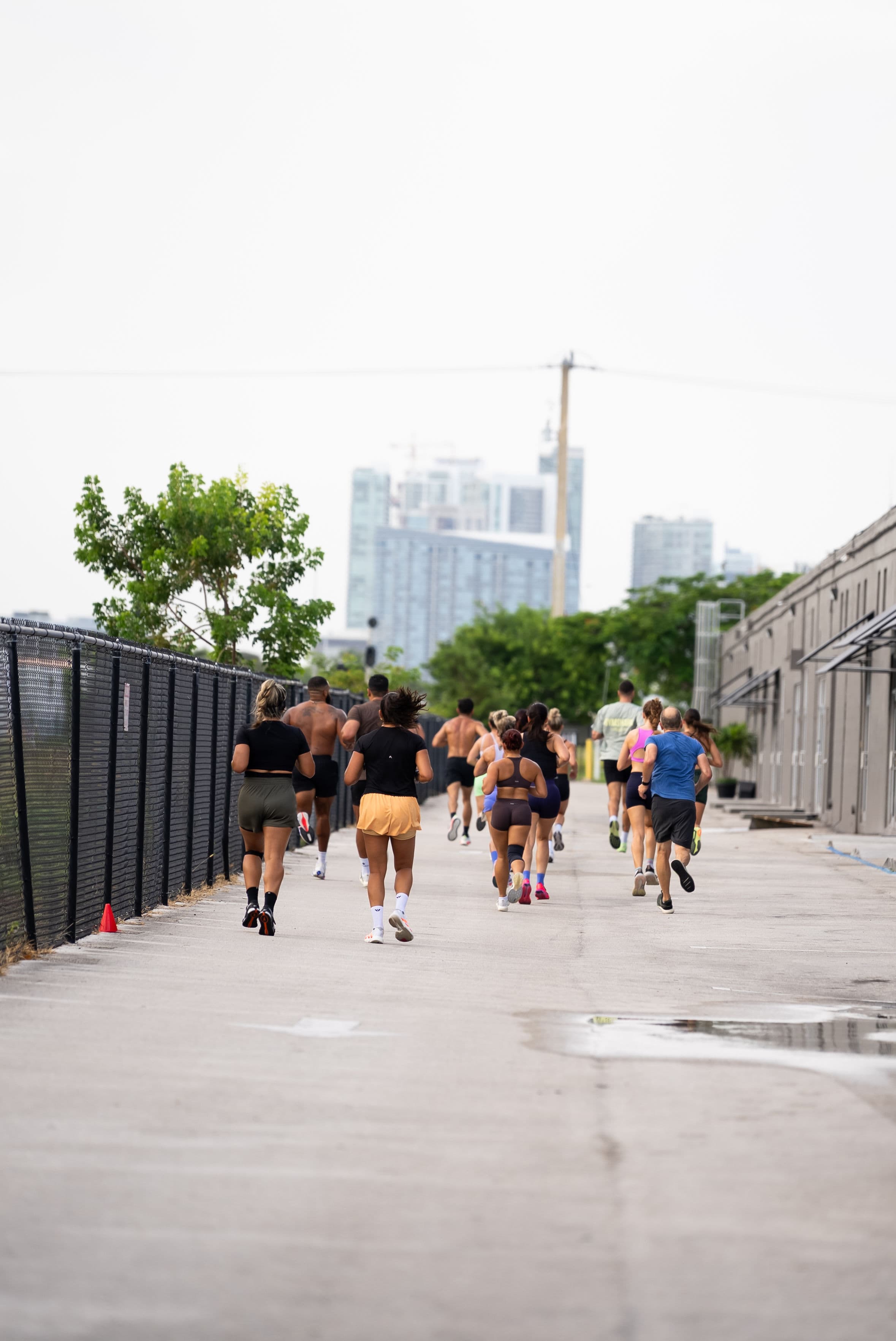 Runners moving together down the line